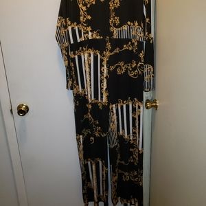 Black an gold jump suit